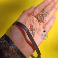 گردنبند و گوشواره پاپیون