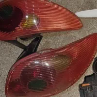 چراغ عقب ۲۰۶ قاب فیلتر هوا تسمه تایم فلاپ ۲۰۶