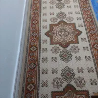 یک عدد میز تلویزیون درحدنو ویک تخته گلیم ۹۰× ۴