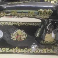 چرخ خیاطی مرد پرنده