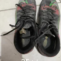 کفش فوتبال وچمن