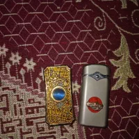 دوتا فندک طوسی وطلایی
