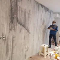 نقاشی ساختمان‌ میکروسمنت پتینه طرح سنگ