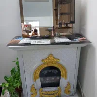 بخاری شومینه و آینه سرویس لامپ دار