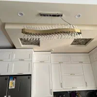 لوستر سالم و شیک و یک عدد تابلو نقاشی کاردست