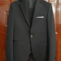 یک دست کت و شلوار