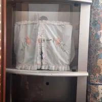 زیرتلویزیونی با تلویزیون