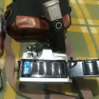 دوربین عکاسی و ضبط|دوربین عکاسی و فیلمبرداری|کنار تخته و کمار, |دیوار