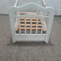 گهواره ثابت و متحرک کودک