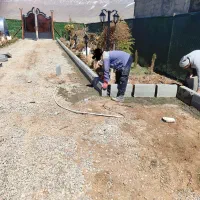 جدول‌‌کاری سنگفرش سنگ‌لاشه محوطه‌سازی‌ موزائیک