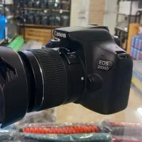 دوربین کنون ۲۰۰۰ دی با لنز ۱۸.۵۵|دوربین عکاسی و فیلم‌برداری|قم, دورشهر|دیوار