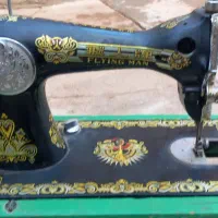 چرخ خیاطی مرد پرنده|چرخ خیاطی و ریسندگی|مسجد سلیمان, |دیوار