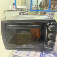 ماکروفر با جوجه گردان باز نشده