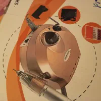 دستگاه کاشت ناخن