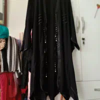 تعدادی لباس مجلسی|لباس|بندر انزلی, انقلاب|دیوار