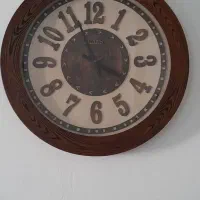 ساعت دیواری چوبی شیک