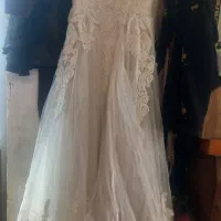 فروش لباس عر وس کارکرده درحدنودوعدد