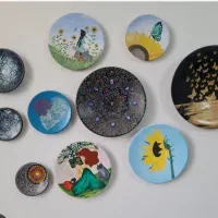 ۱۲عدد دیوار کوب سفالی براق و نگین دار