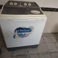 لباسشویی دو قلو و بخاری سالم