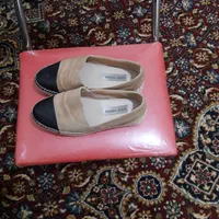 کفش دست دوم مردانه و یه کفش زنانه نو هست