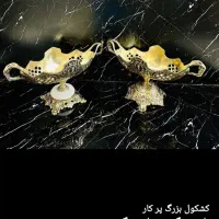 میز‌ومجسمه‌برنزی