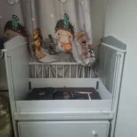 تخت گهواره ای کنار مادر