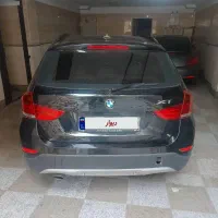 ۲۰۱۵ BMW x1 1/8 بدون رنگ مشکی