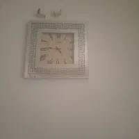 ساعت دیواری اینه ای