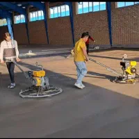 بتن ریزی کف با ماله پروانه و دوربین