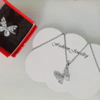 نیم ست استیل نقره ای پروانه ای ( گردنبند و انگشتر)