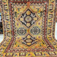 قالیچه طرح کوبایی طلایی طرح قشقایی گل ابریشم