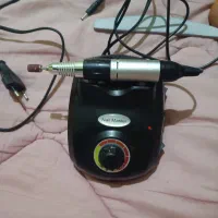 دستگاه کاشت ناخن