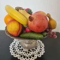 ظرف میوه خوری بهمراه میوهای مصنوعی