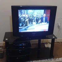 تلویزیون 29اینچ سامسونگ به همراه میزشیشه ای