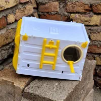 لانه ی پرنده دارای سینی کشویی و ۲ در بالا و کناری