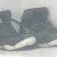 دوتا دوبنده کشتی با یک جفت کفش نو نو نو