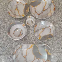 ملامین طرح سنگ طوسی و طلایی