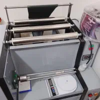 دستگاه رول کن سفره وپلاستیک زوباله وفریزری