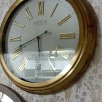 ساعت لوتوس درجه یک کاملا نو|ساعت دیواری و تزئینی|خرم‌آباد, |دیوار