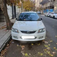 مزدا۳۲۳ سفید سالم تیپ ۵