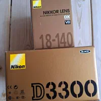 دوربین نیکون با لنز 140-18 با لوازم در حد آکبند