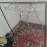 یک عدد رگال لباس و دوعدد آویز فلزی لباس