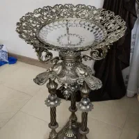 میوه خوری برنجی کنار سالنی