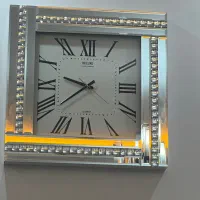 ساعت دیواری ایینه ای