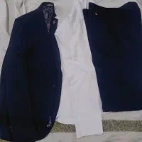 یک عدد کت شلوار مردانه با پیراهن نو