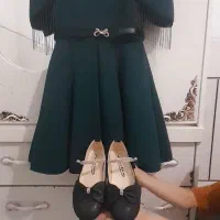 دوپیراهن ویک جفت کفش به 7الی 8سال میخوره