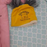 کاپشن و سرهمی و کلاه نوزاد