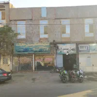 فروش یک واحد مسکونی وچهاردربند مغازه تجاری