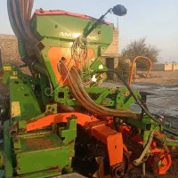 تراکتور نیوهلند اسکریپر و کمبینات