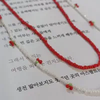 گردنبند و دستبند منجوقی